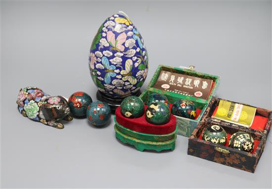 A Chinese cloisonne pig, four pairs of Baoding balls and a Japanese cloisonne egg on stand,
